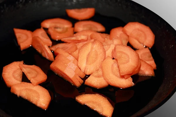 Carrots fried on a frying pan — Stock Photo, Image