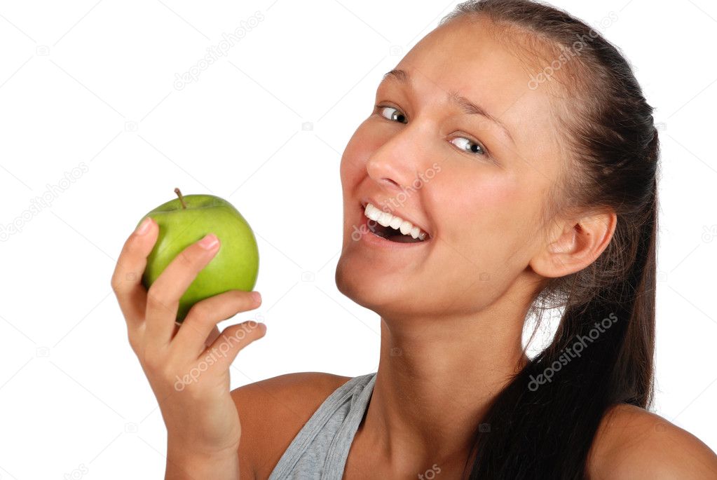 Portret of young smiling beautiful women with green apple