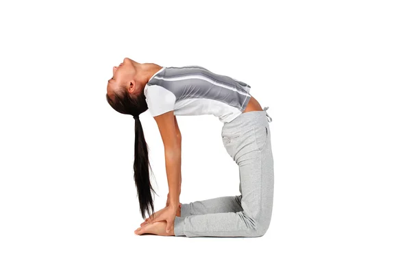 Beautiful young woman doing yoga exercise. — Stock Photo, Image