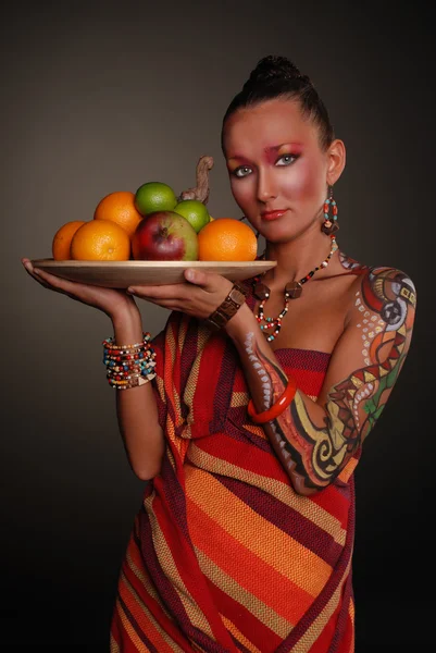 Elegant model with bright makeup and body art. — Stock Photo, Image