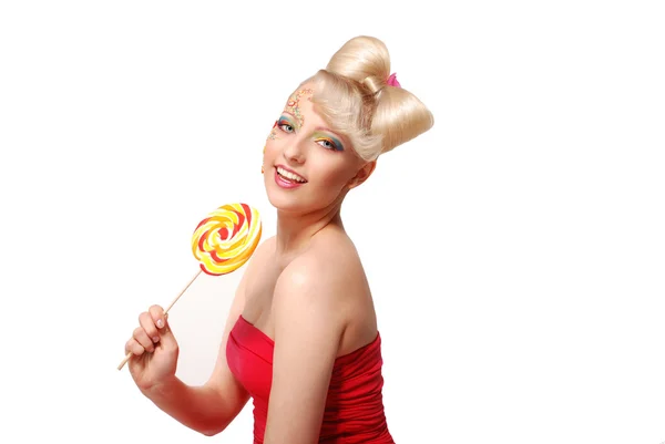 Roztomilá blonďatá panenka styl model s bonbóny — Stock fotografie