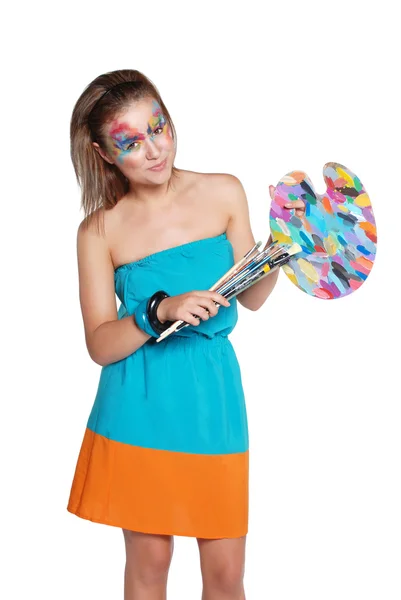 Cute happy girl with colored palette and brushes — Stock Photo, Image
