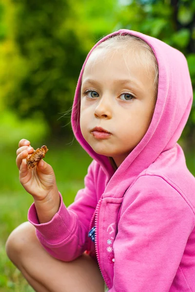 Little girl eating — Stock Photo, Image
