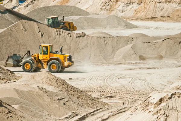 Working machines at gravel pit — Stock Photo, Image