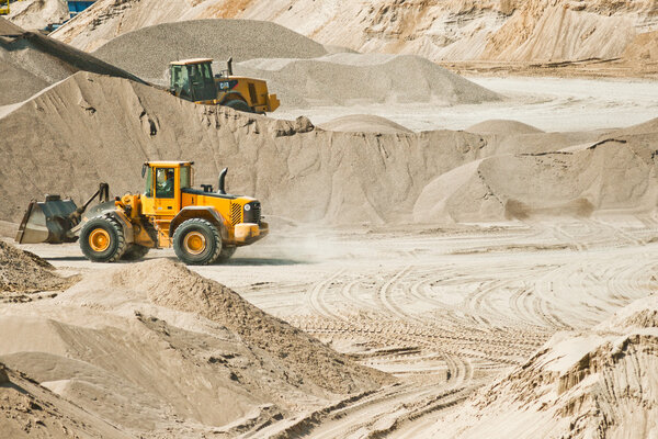Working machines at gravel pit