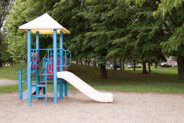 Children's play structure in the park clipart