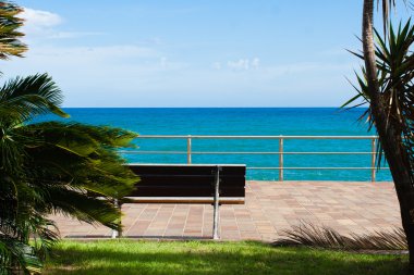 Rilssante bench in front of the Ligurian Sea clipart