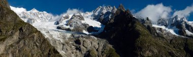 Immense panorama of snow-covered massif of Mont Blanc clipart