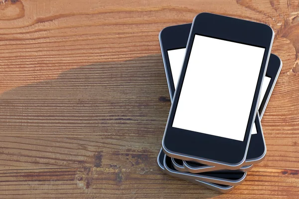 Régler les smartphones avec la technologie d'écran tactile sur la surface en bois (version de composition droite ) — Photo