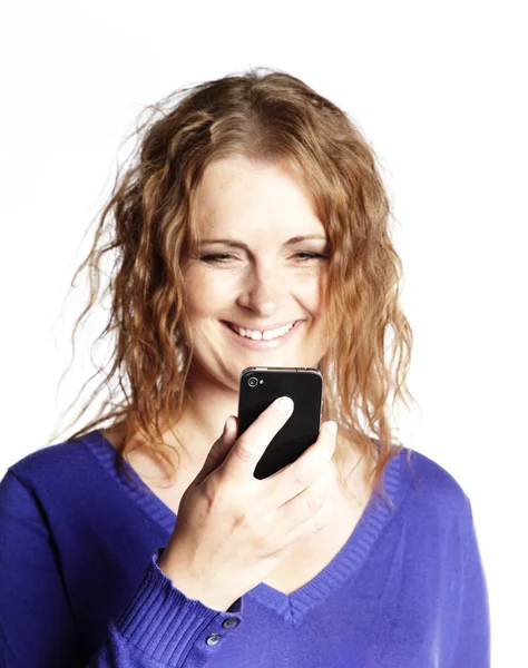 Woman looking at her phone — Stock Photo, Image
