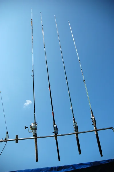 Dört balıkçılık çubuklar Stok Resim