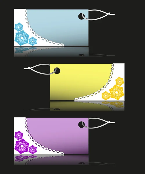 Tre färgglada prislappar på svart — Stock vektor