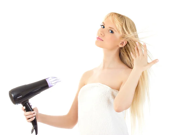 Linda loira segurando secador de cabelo — Fotografia de Stock