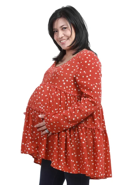 Беременная женщина в повседневной одежде — стоковое фото
