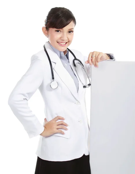 Female doctor with a blankboard — Stock Photo, Image