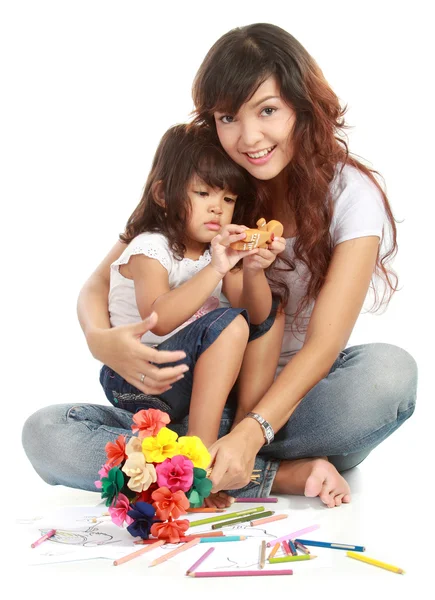 Smiling embracing mom and daughter — Stock Photo, Image