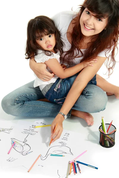 Mom and her little daughter drawing together — Stock Photo, Image