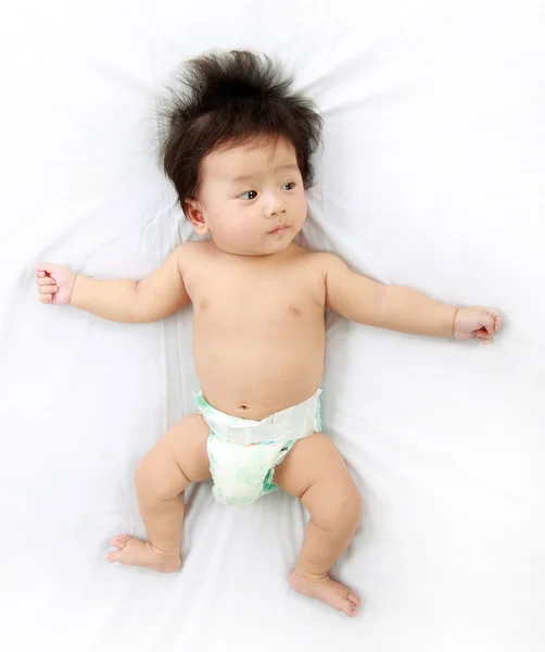 Bambino sul letto — Foto Stock