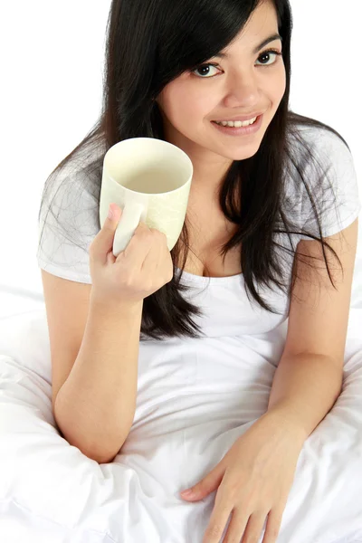 Young girl with a cup of tea — Stock Photo, Image