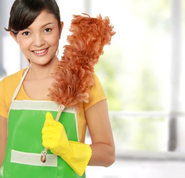 Woman with cleaning sweep