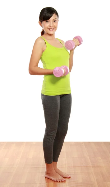Exercising with dumbbells — Stock Photo, Image
