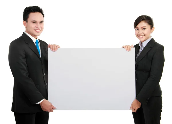 Equipe de negócios com cartão em branco grande — Fotografia de Stock