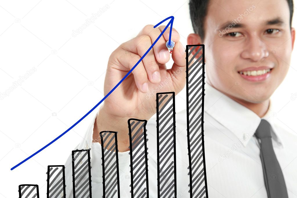 Businessman drawing a rising diagram