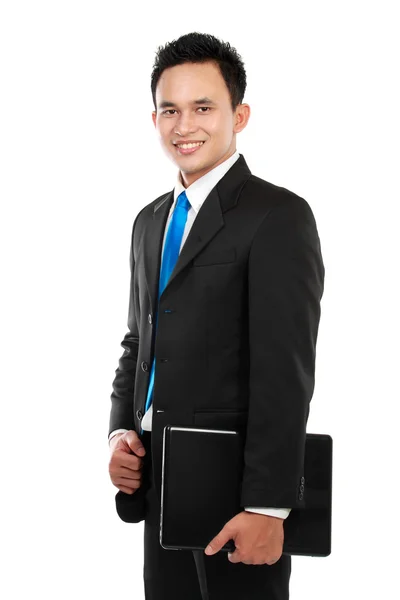Aziatische zakenman met een laptop — Stockfoto
