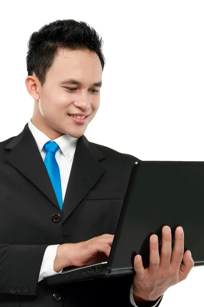 Business man using laptop Stock Picture