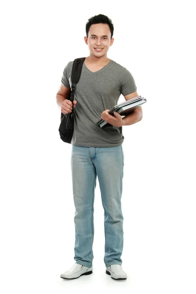 Студент колледжа с книгой и сумкой — стоковое фото