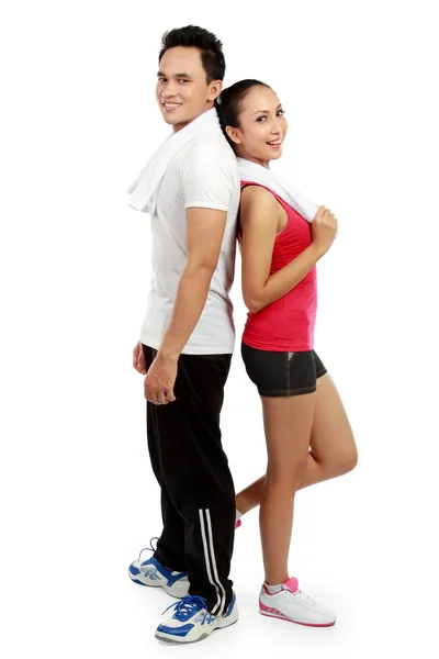 Fitness Smiling young man and woman — Stock Photo, Image