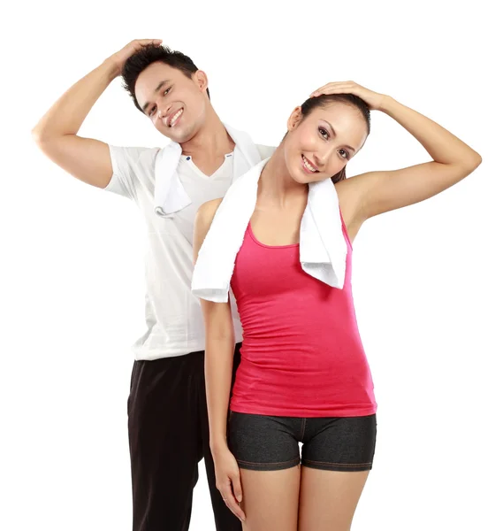 Man and woman stretching — Stock Photo, Image