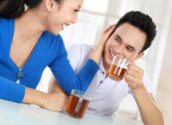 Young couple having a tea — Stock Photo, Image
