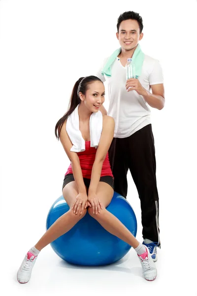 Muž a žena cvičení — Stock fotografie