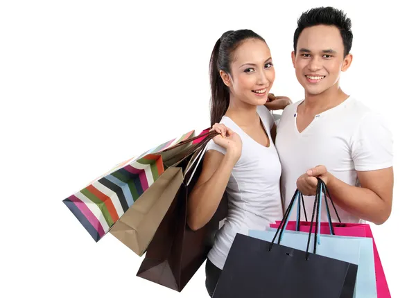 Attraktives glückliches Paar beim Einkaufen — Stockfoto