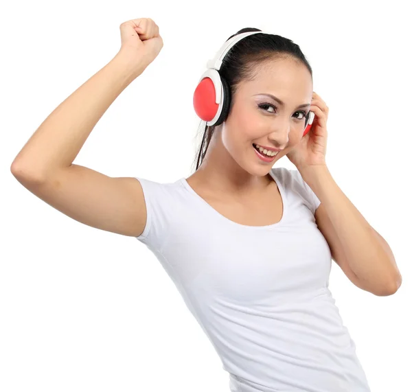 Kobieta tańczy do muzyki w słuchawkach — Zdjęcie stockowe