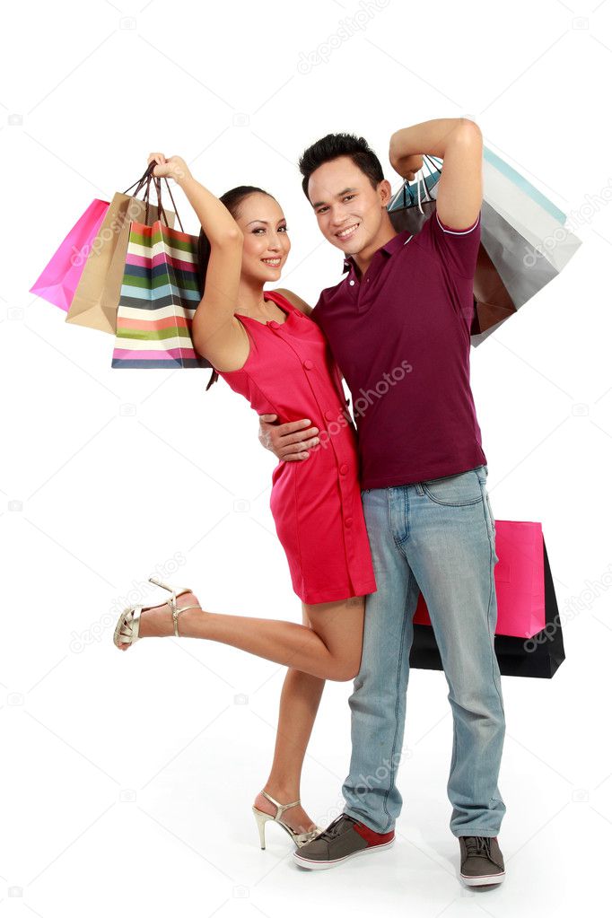 Happy couple with shopping bag