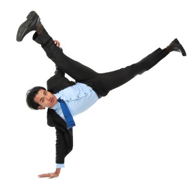 Business man doing handstand