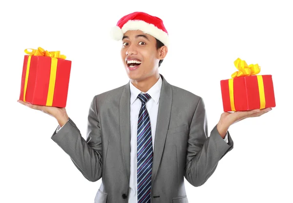 クリスマス プレゼントを持ったビジネスマン — ストック写真