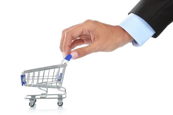 Hand and shopping cart — Stock Photo, Image