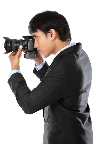 Fotógrafo usando a câmera dslr — Fotografia de Stock