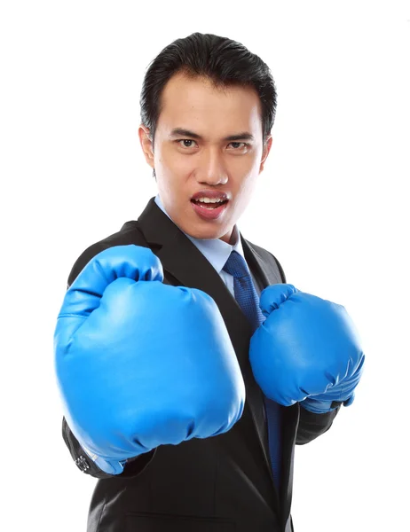 Businessman using boxing glove — Stock Photo, Image