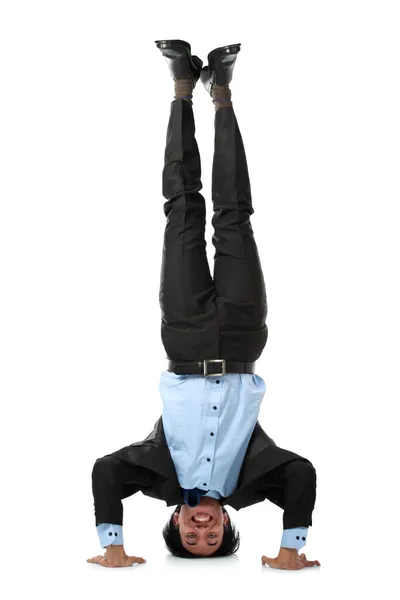 Business man doing handstand — Stockfoto