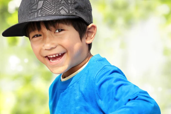 Kid smiling to the camera — Stock Photo, Image