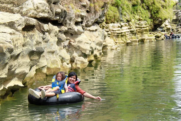 stock image Family on inflatable tube