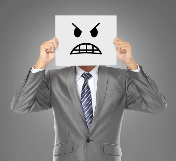 Podnikatel s rozzlobený maskou — Stock fotografie