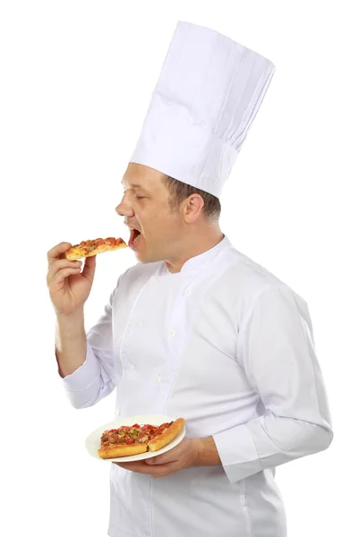 Chef comiendo pizza — Foto de Stock