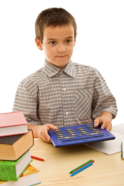 Schoolboy com calculadora — Fotografia de Stock