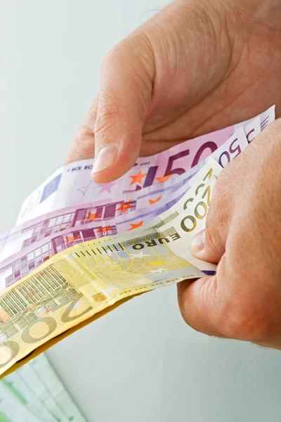 Notas de euro na mão — Fotografia de Stock