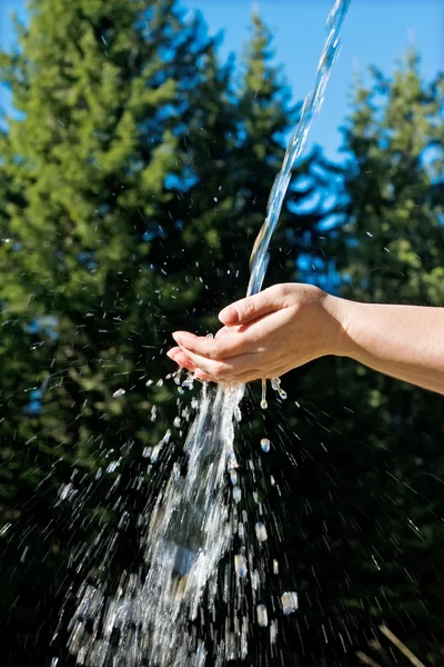 Hand with water — Stock Photo, Image